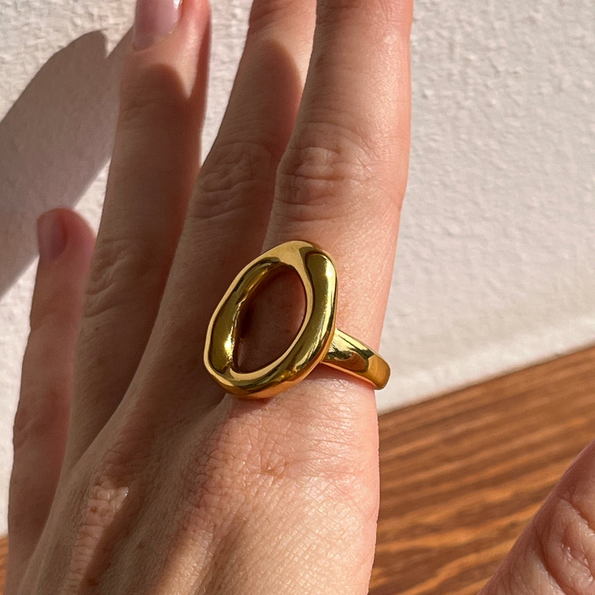 Double Loop Ring shown on hand for scale — VAL-T