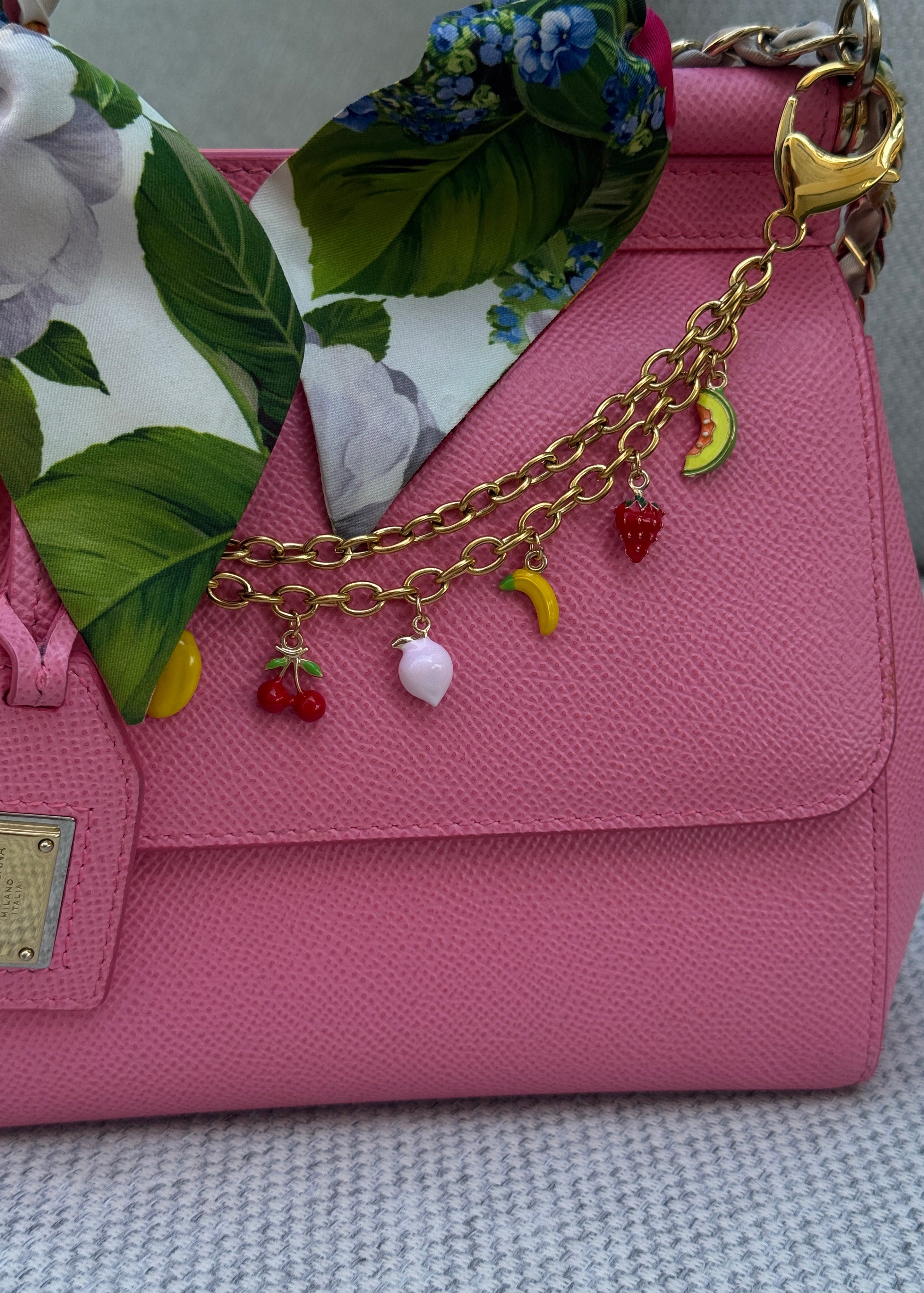 BAG CHARM GILDED IN 18-CARAT GOLD