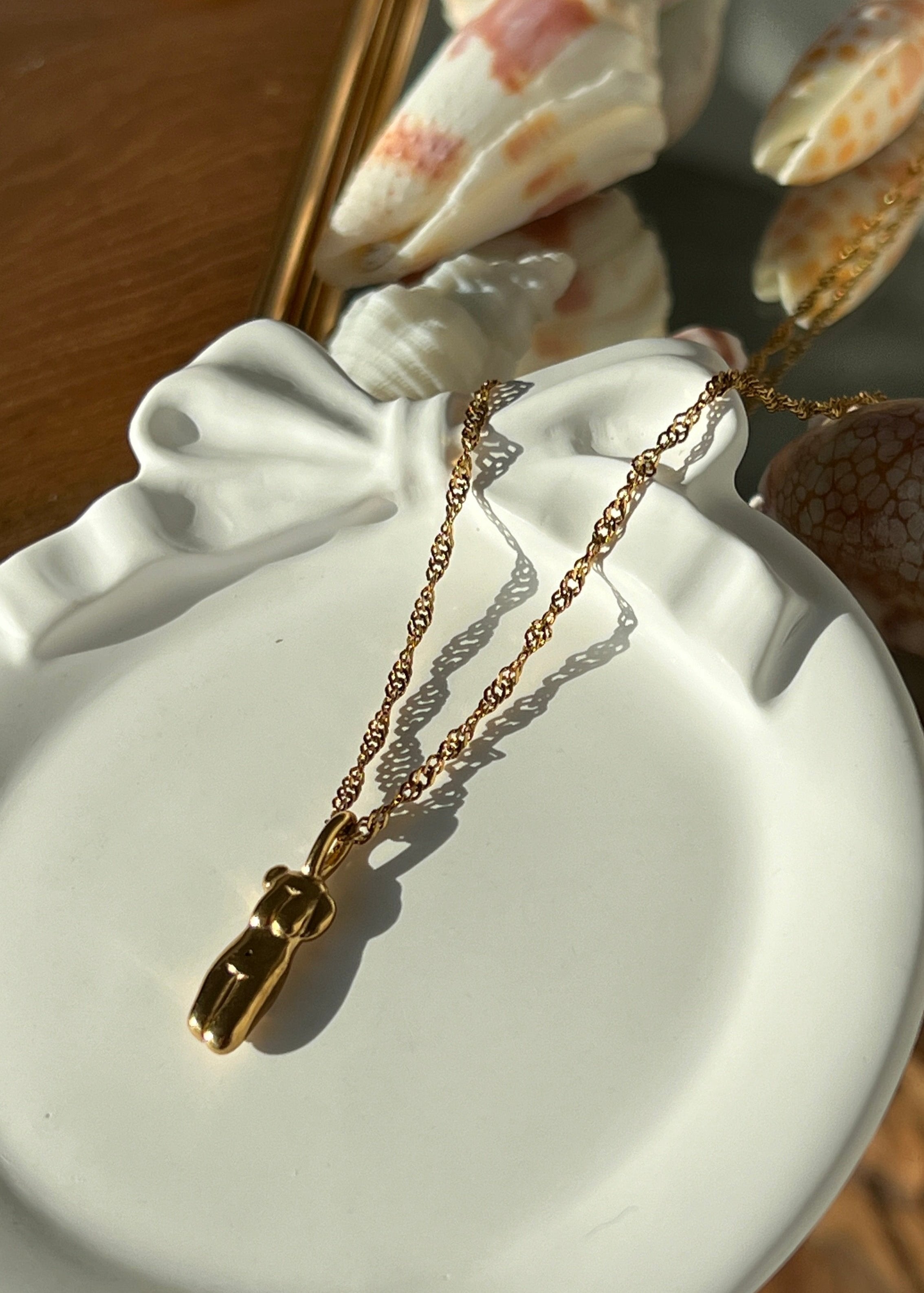 Sculptural pendant charm gilded in 18 Carat Gold