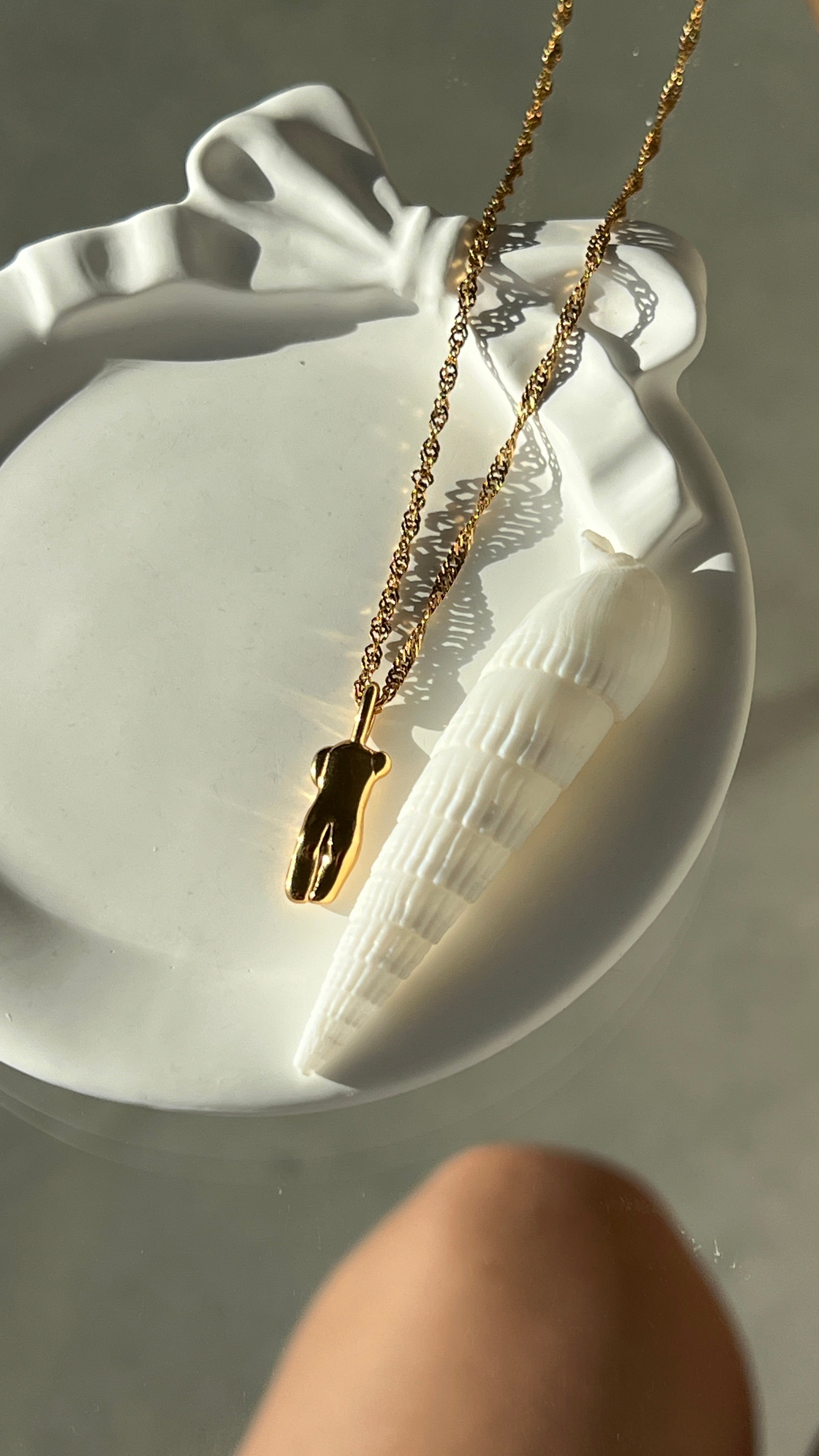 Sculptural pendant charm gilded in 18 Carat Gold